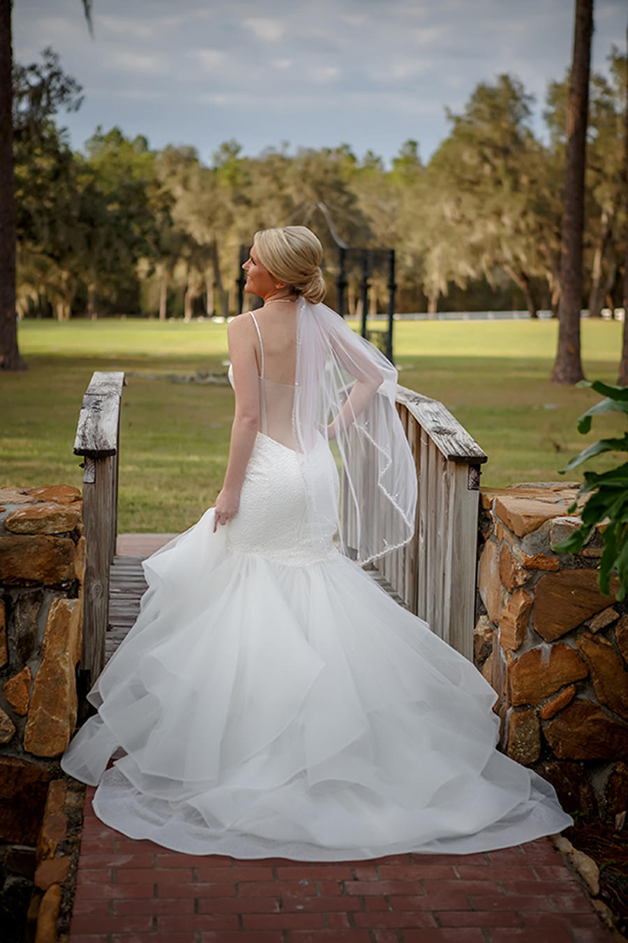 Outdoor Bridal Portrait wearing Mermaid Pnina Tornai Wedding Dress and Beaded Veil | Tampa Bay Wedding Venue The Lange Farm | Photographer Brian C Idocks Photographics