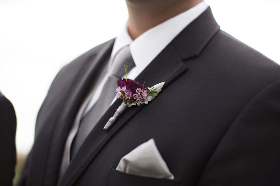 Groom in Black Suit with Burgundy Boutonnière