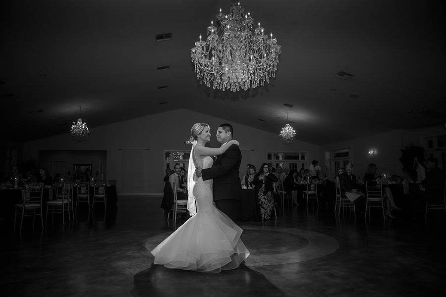 First Dance Portrait under Chandelier, Bride wearing Pnina Tornai Mermaid Wedding Dress | Tampa Bay Wedding Venue The Lange Farm | Photographer Brian C Idocks Photographics