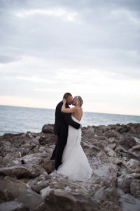 Bridal and Groom Outdoor Wedding Portrait on Rocks | Clearwater Beach Wedding Photographer Djamel Photography