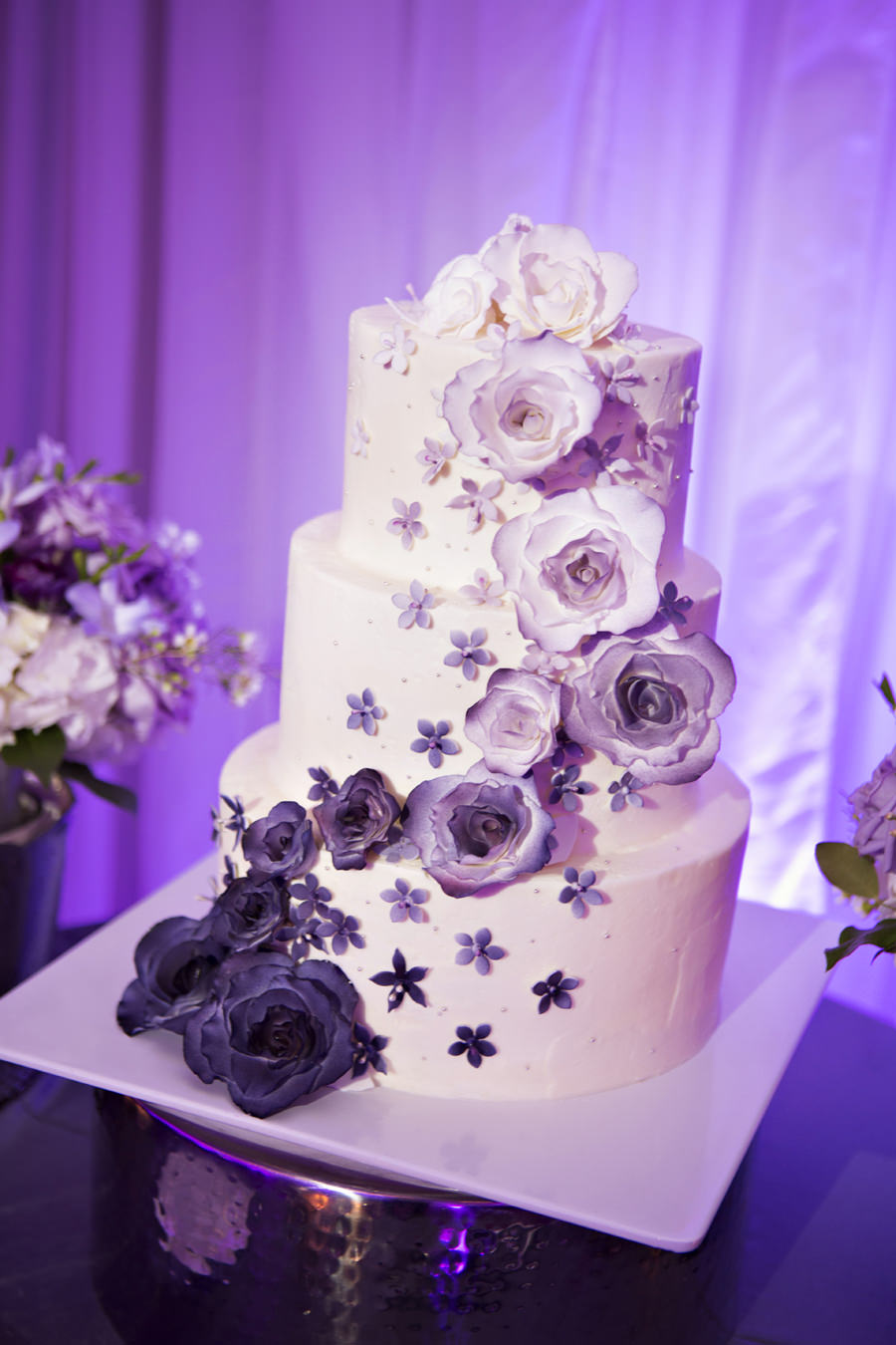 3-Tier White and Purple Round Wedding Cake with Cascading Sugar Flowers