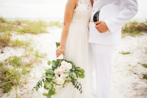 Outdoor Clearwater Beach Bride and Groom Portrait for Navy Military Wedding with White, Peach and Greenery Bouquet | Tampa Bay Photographer Limelight Photography