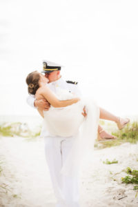 Outdoor Clearwater Beach Bride and Groom Portrait for Navy Military Wedding with White, Peach and Greenery Bouquet | Tampa Bay Photographer Limelight Photography
