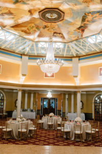 Gold Ivory and Blush Ballroom Wedding Reception Decor at Tampa Bay Wedding Venue Safety Harbor Resort & Spa with Gold Chiavari Chairs, Low White Floral Centerpieces | Tampa Bay Wedding Planner Special Moments Event Planning | Signature Event Rentals