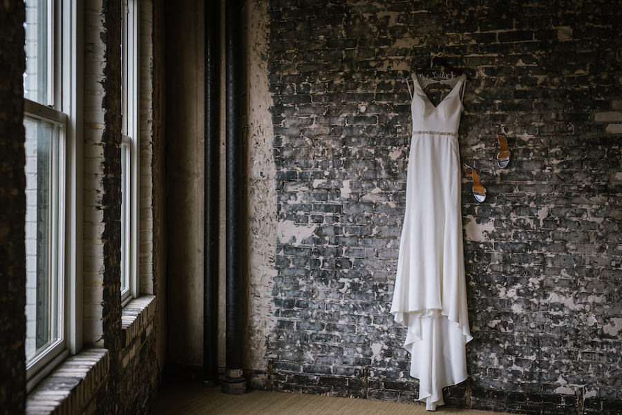 Martina Liana Wedding Dress and Strappy Silver Wedding Shoes on Hanger