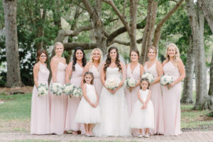 Outdoor Bridal Party Portrait with Mismatched Blush Pink Hayley Paige Bridesmaids Dresses and Flower Girls and Watters Wedding Gown