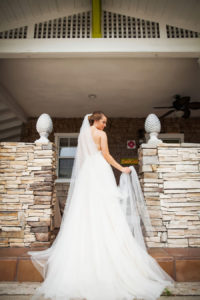 Outdoor Bridal Wedding Portrait with Long White Veil and Train and Watters Wedding Dress