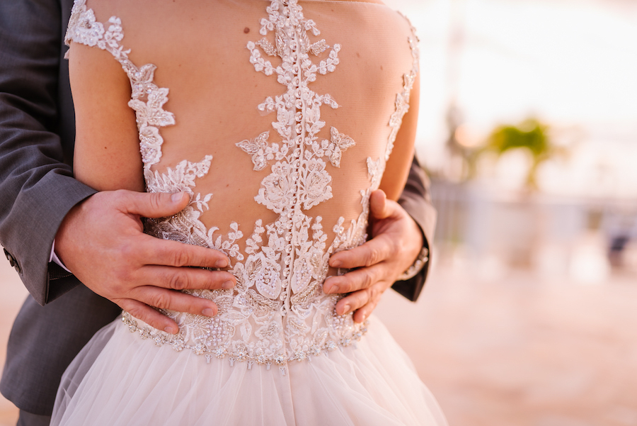 Outdoor Bride and Groom Portrait with Lace Backed Wedding Dress