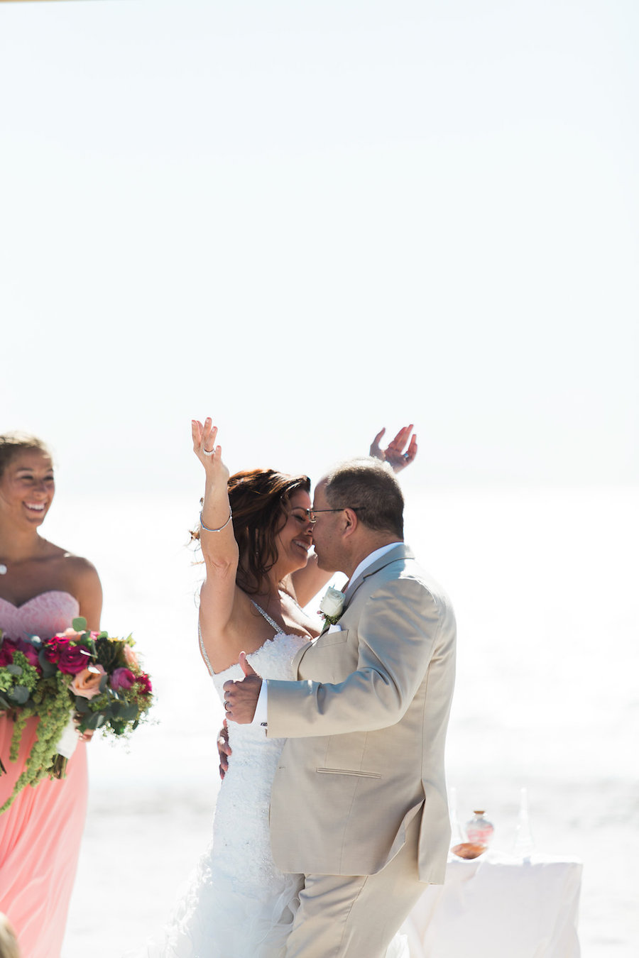 First Kiss Beach Wedding Ceremony Portrait | Siesta Key, Florida