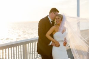 Outdoor Waterfront Wedding Ceremony with Mermaid Sweetheart Belted Dress at Tampa Bay Wedding Venue Westshore Yacht Club | Photographer Andi Diamond Photography