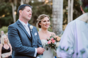 Outdoor Wedding Ceremony Portrait with Pink and Peach Rose Bouquet