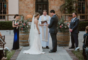 Outdoor Wedding Ceremony with Rustic Barrels with Tall Natural Greenery and Pink and White Flowers | Sarasota Venue The Ringling | Tampa Bay Florida Wedding Planner NK Productions