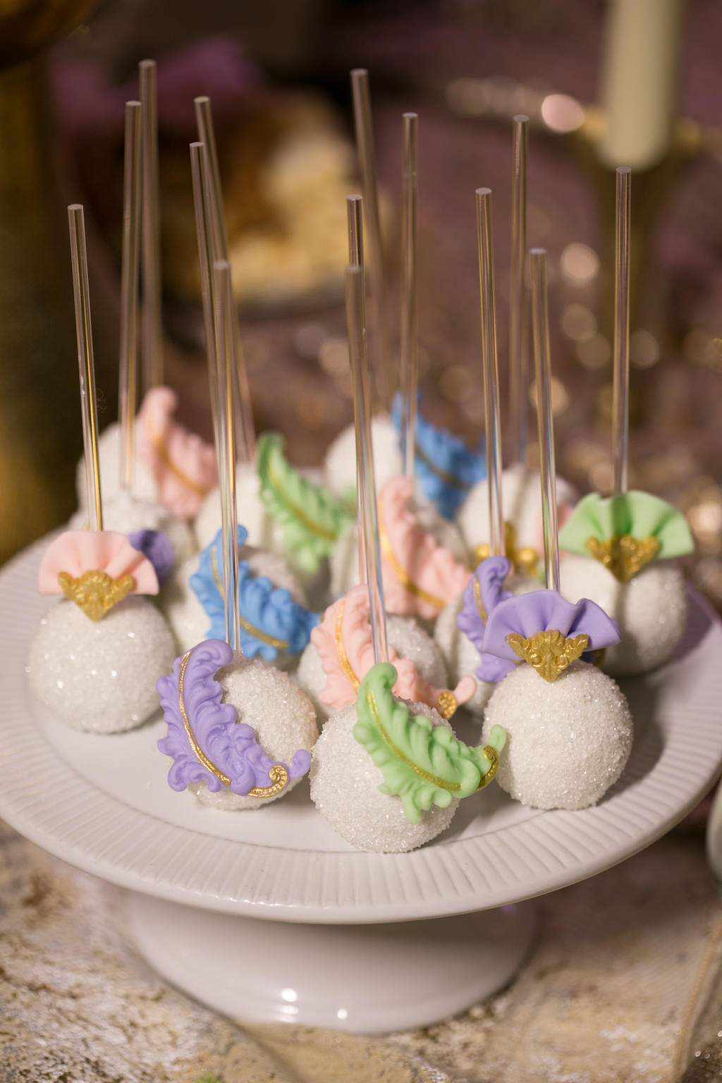 Modern Elegant Tropical Floral Inspired Purple, Pink, Green and Gold Fan and Feather Cake Pops by Tampa Bay Wedding Bakery Sweetly Dipped Confections