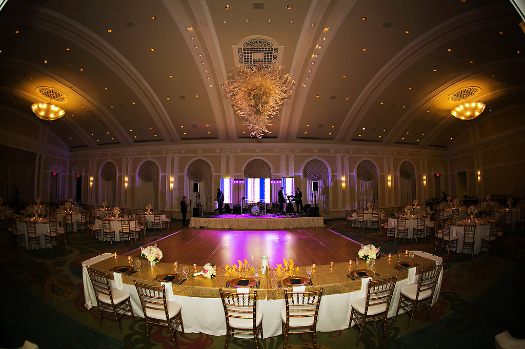 Gold and White Hotel Ballroom Wedding Reception with Gold Linen, Low White and Pink Centerpieces, Gold Chiavari Chairs | Downtown St. Pete Hotel Wedding Venue Vinoy Renaissance