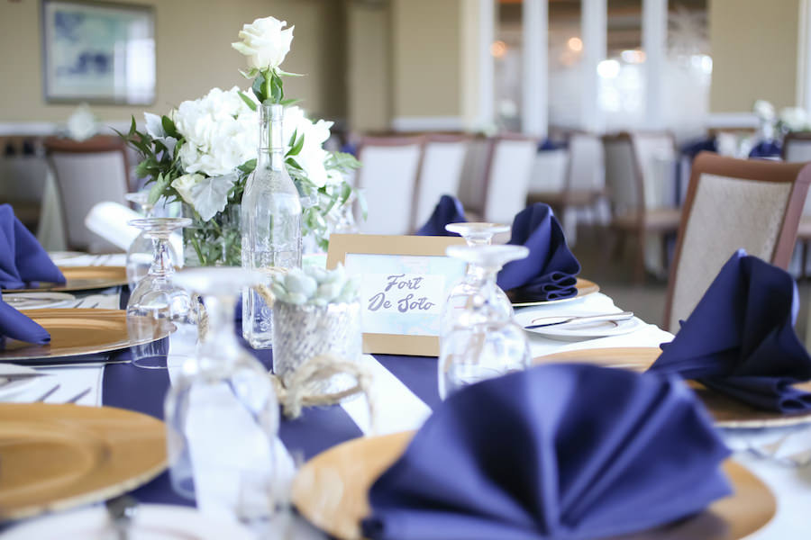 Nautical Blue and White Wedding with Succulent and Rose Centerpieces in Mismatched Vases | Navy Blue Linen from Tampa Bay Wedding Rental Over the Top Linen Rental