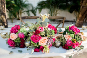 Wedding Reception Decor Sweetheart Table Centerpiece with Blush Fuchsia Magenta and Red Rose with Greenery and Succulents and Silver Mercury Votives