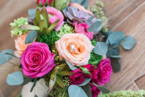 Engagement Ring with Peach and Fuchsia Rose Bouquet with Greenery and Succulents | Sarasota Tropical Wedding