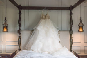 Gold Beaded Bodice Ball Gown Wedding Dress on Hanger