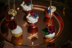 Red, Blue and Gold Cake Pop Favors Dipped in Glitter with Flowers | Tampa Bay Wedding Dessert Bakery Pop Goes The Party