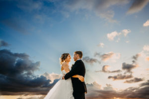 Sunset Bride and Groom Outdoor Rooftop Downtown Tampa Wedding Portrait by Tampa Bay Wedding Photographer Rad Red Creative | Private Venue The Centre Club