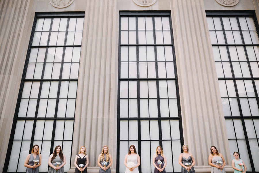 Downtown Tampa Outdoor Industrial Bridal Party Portrait with Mismatched Gray Bridesmaids Dresses | Tampa Bay Wedding Venue The Vault