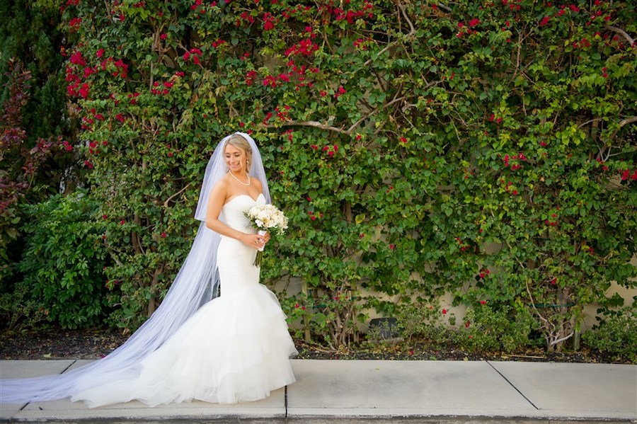 Outdoor Garden Bridal Portrait with Ivory Bouquet with Greenery wearing Sweetheart Mermaid Wedding Dress with Long Veil | Tampa Wedding Photographer Andi Diamond Photography