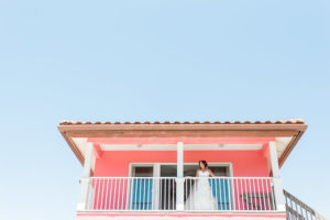 Outdoor Bridal Portrait on Porch of Siesta Key Beach Villa Wedding Venue Tropical Breeze Resort