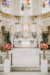 Traditional Church Wedding Ceremony with Tall Tropical Bright Peach and Pink Flowers in Gold Vases | Tampa Ceremony Venue Sacred Heart Catholic Church