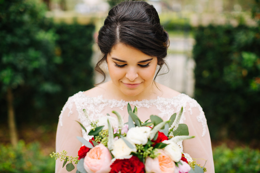 Outdoor Garden Bridal Portrait with White, Blush, and Red Roses with Greenery Bouquet