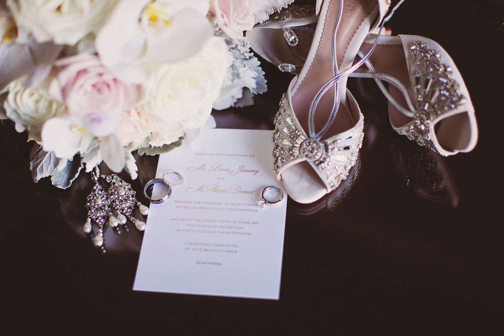 Vintage Glam Style Bridal Accessories with Beaded Blush Peep Toe Wedding Shoes and Pearl Drop Beaded Earrings, White Orchid And Blush Pink Bouquet with Greenery, Engagement Ring and Wedding Band, and Gold and White Invitation