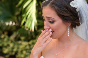 First Look Bridal Portrait Wearing Natural Pearl Long Drop Earrings and Floral Hair Piece | Tampa Bay Wedding Photographer Caroline and Evan Photography