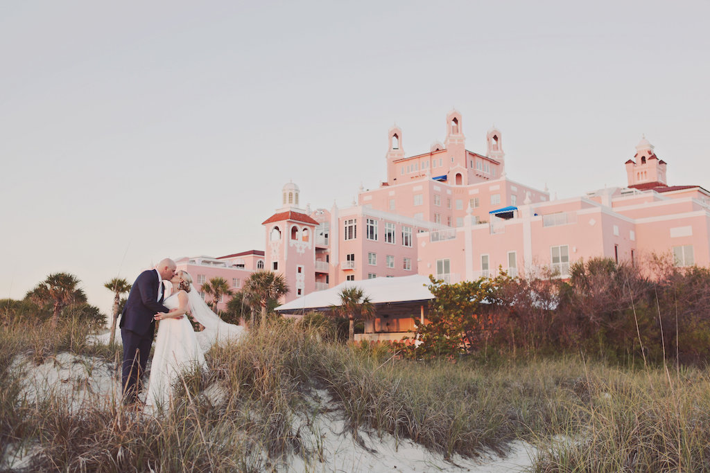 Outdoor Florida Beach Bride and Groom Wedding Portrait | St. Petersburg Historic Hotel Wedding Venue The Don Cesar | Planner Parties a la Carte