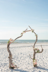 Natural Nautical Inspired Driftwood Wedding Arch Decorated with Pink and White Roses with Greenery | Florida Beach Wedding Ceremony