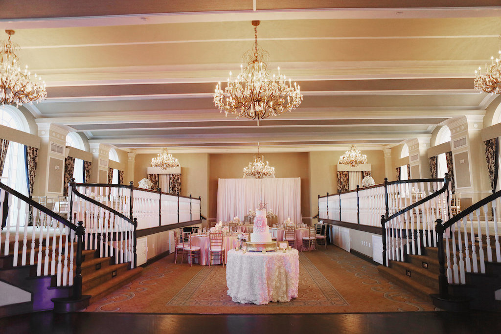 Blush and Gold Hotel Ballroom Wedding Reception with Four Tiered Round White Wedding Cake | St. Petersburg Historic Hotel Wedding Venue The Don Cesar | Planner Parties a la Carte