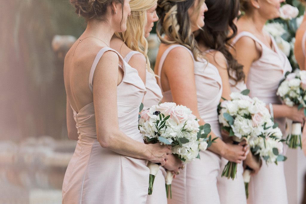 Bridesmaids Wedding Ceremony Portrait in Blush Pink Dresses with White, Pink and Greenery Bouquets