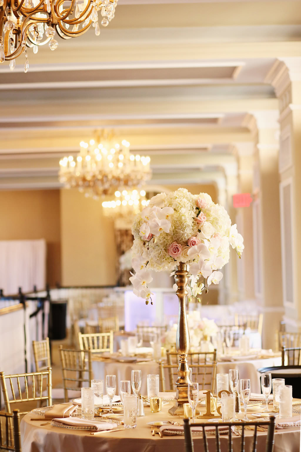 Tall Wedding Reception Centerpiece with White Hydrangeas and Orchids, Blush Roses in Tall Gold Vase | Tampa Bay Wedding Venue The Don Cesar | St Petersburg Wedding Planner Parties A La Carte