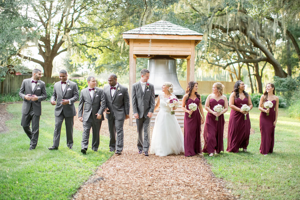 Wedding Party Portrait with Groomsmen in Gray Suits with Maroon Bowties, Bridesmaids in Strapless Floor Length Burgundy Dresses | Tampa Bay Wedding Photographer Rad Red Creative | Dress Shop Truly Forever Bridal | Bella Bridesmaid