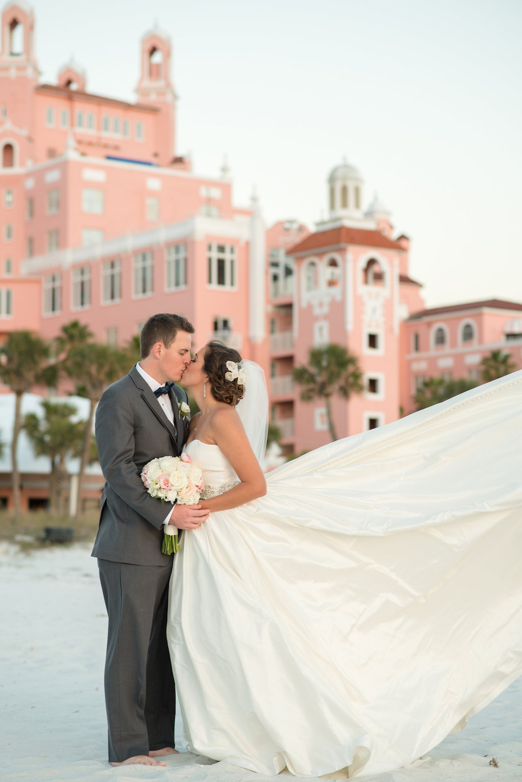 Outdoor Beach Wedding Portrait with Pink and White Bouquet, Groom in Gray Suit | St Petersburg Florida Wedding Venue The Don Cesar | Tampa Bay Wedding Photographer Caroline and Evan Photography
