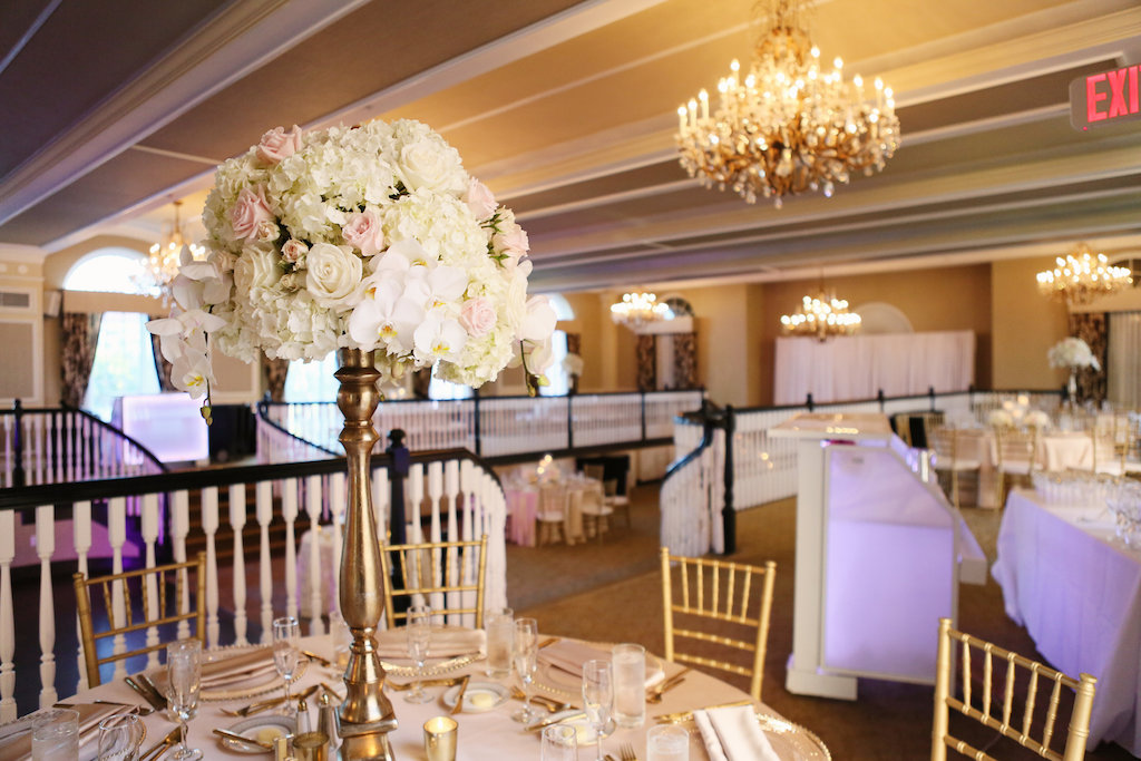 Tall Wedding Reception Centerpiece with White Hydrangeas and Orchids, Blush Roses in Tall Gold Vase | St. Petersburg Historic Hotel Wedding Venue The Don Cesar | Planner Parties a la Carte