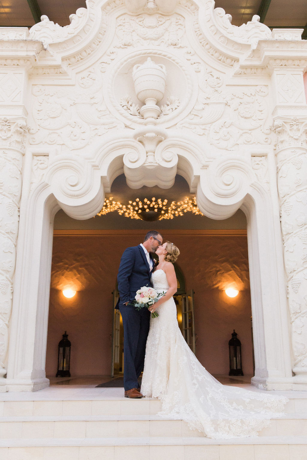 Bride and Groom Wedding Portrait on Front Steps of 1920s Architecture Tampa Bay Wedding Venue The Vinoy Renaissance