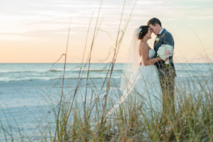 Outdoor Beach Wedding Portrait with Pink and White Bouquet, Groom in Gray Suit | St Petersburg Florida Wedding Venue The Don Cesar | Tampa Bay Wedding Photographer Caroline and Evan Photography