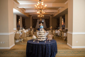 Elegant Navy Blue and White Wedding Reception Dessert Table with Cupcake Tower and White and Blue Bride and Groom Round Cake Topper | Tampa Bay Wedding Baker The Artistic Whisk