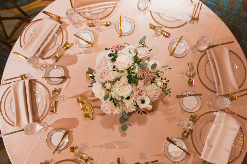 Low Pink Rose and White Anemone Centerpiece with Greenery in with Blush Pink Linens and Gold and White China and Silverware | Tampa Bay Event Planner Parties A La Carte
