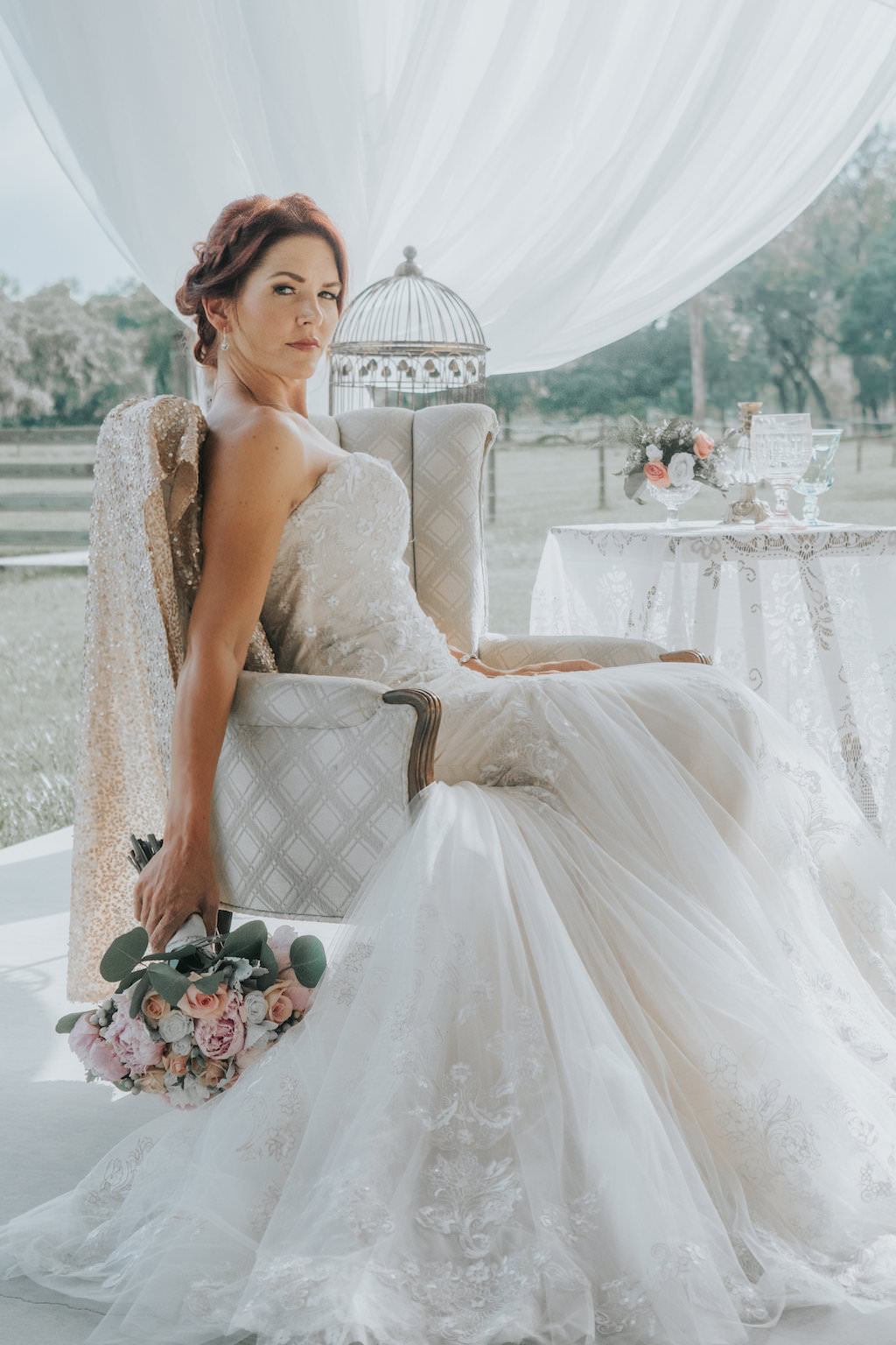 Rustic Farm Wedding Bridal Portrait with Pink and Peach Bouquet with Greenery, White Drapery, and Vintage Bird Cage | Tampa Bay Wedding Planner Kelly Kennedy Weddings and Events
