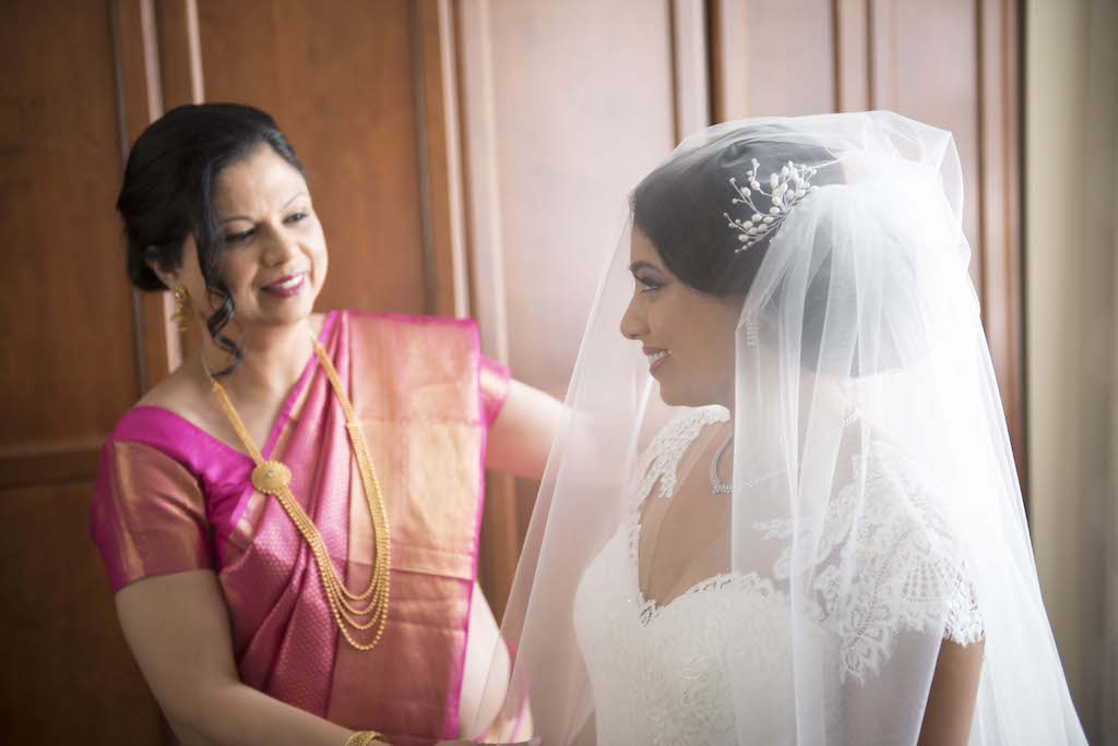 Bride Getting Ready Portrait Wearing Floral Hair Accessory | Multicultural Indian Wedding