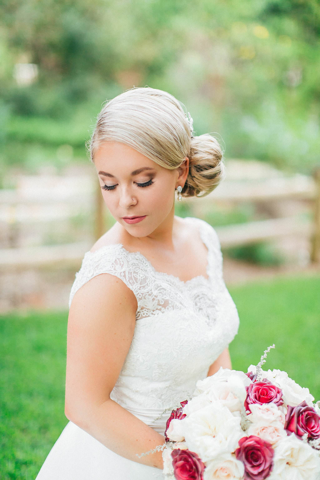 Outdoor Garden Bridal Portrait with Blush, Red, and Cream Rose Bouquet and Lace Wedding Dresses | Tampa Bay Wedding Photographer Rad Red Creative | Bridal Shop Truly Forever Bridal