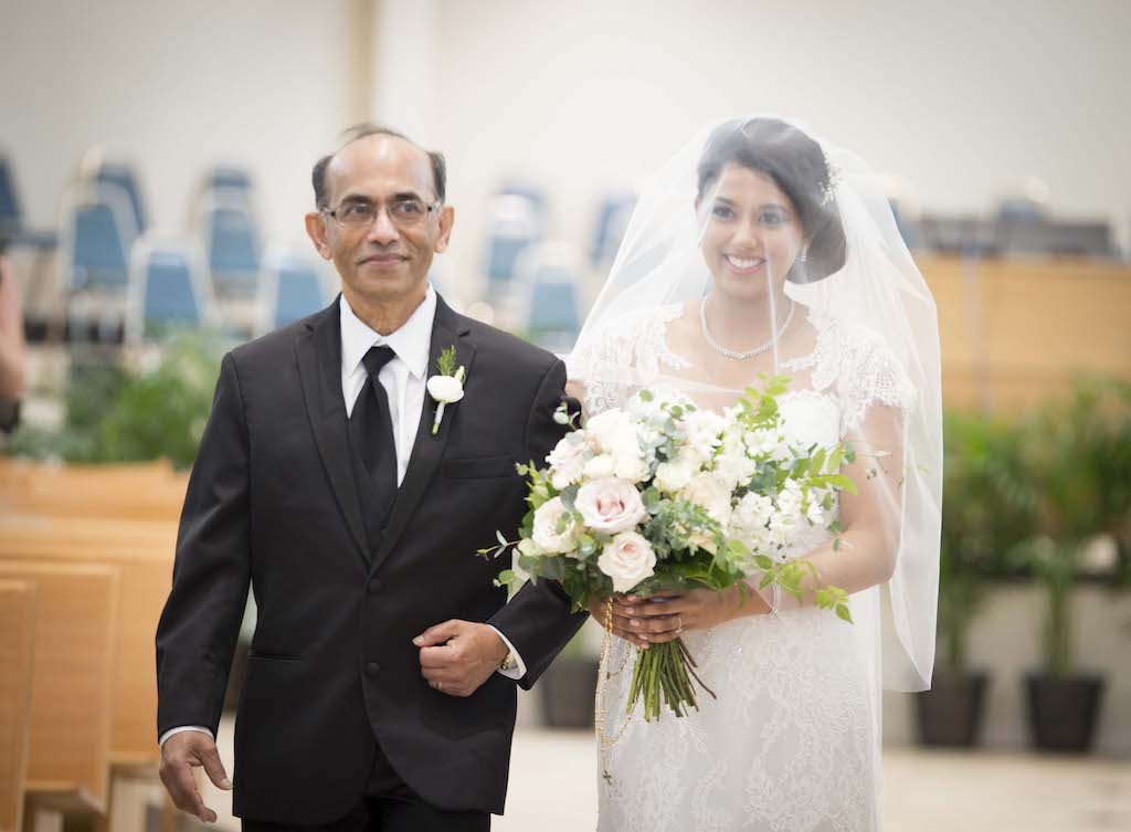 Traditional Church Ceremony Bride with Father Aisle Portrait with Blush and White Flower with Greenery Bouquet | Multicultural Indian Wedding