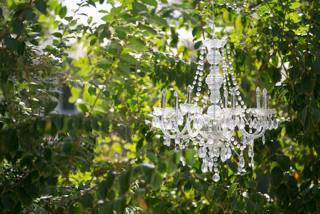 Chrystal Chandelier in Trees Wedding Decor