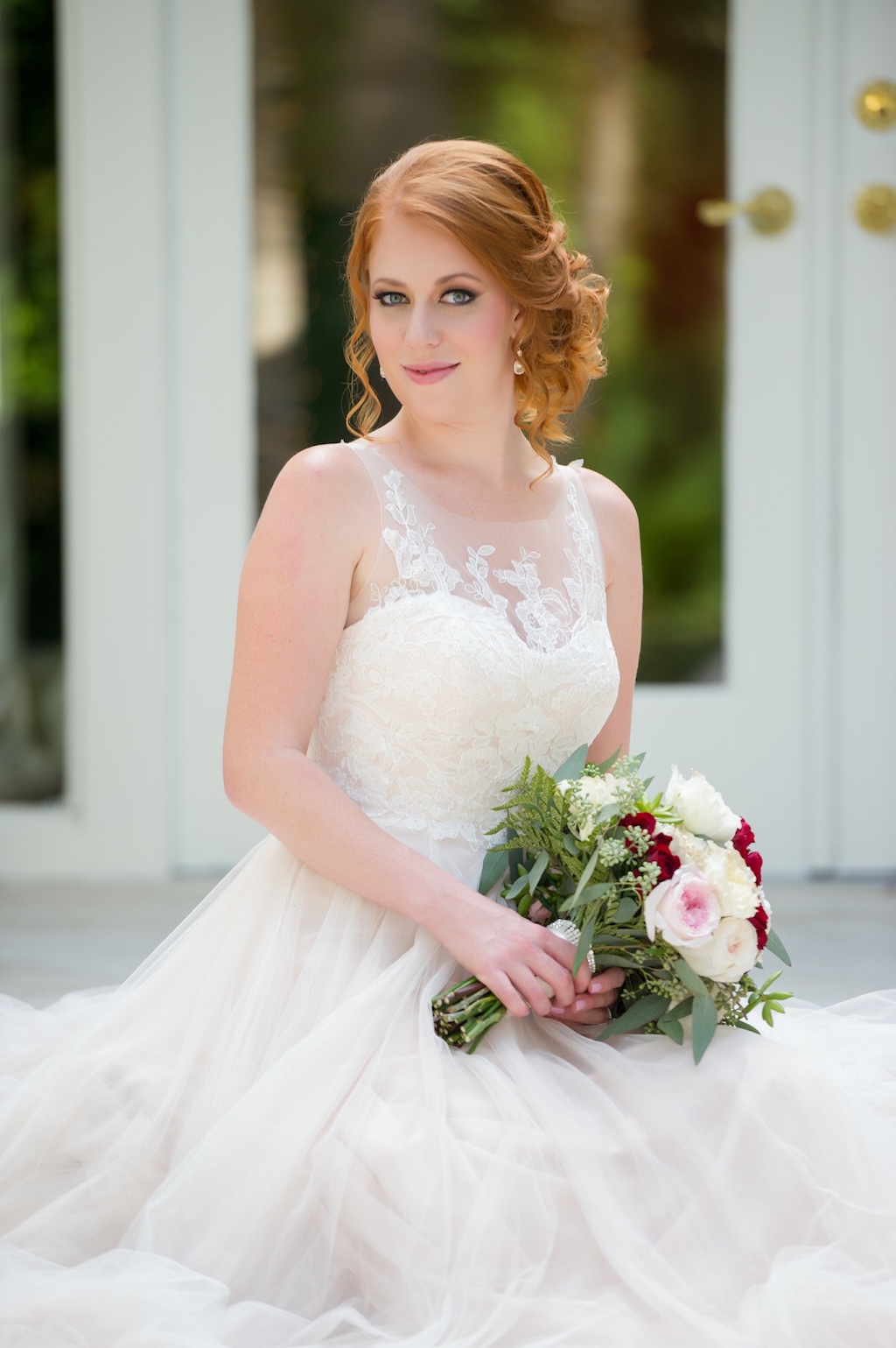 Outdoor Garden Bridal Portrait in Lace Princess Blush Wedding Dress with White, Pink, and Red Rose Bouquet with Greenery | Tampa Bay Wedding Photographer Andi Diamond Photography | Hair and Makeup Michele Renee The Studio