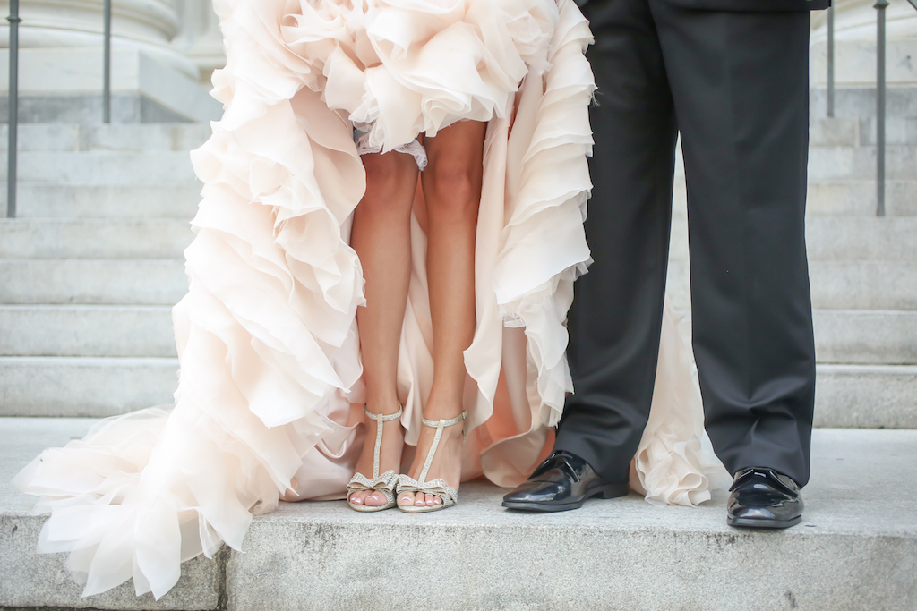 Bride and Groom Wedding Portrait with Layered Blush Pink Wedding Dress and Strappy Open Toed Silver Glitter Bow Wedding Shoes